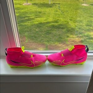 Nike soccer cleats. kids size 5.  no laces. pull on only.  worn one season